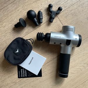 SOLD. Hypervolt massage gun. Charger, 5 massage heads, and instructions include.